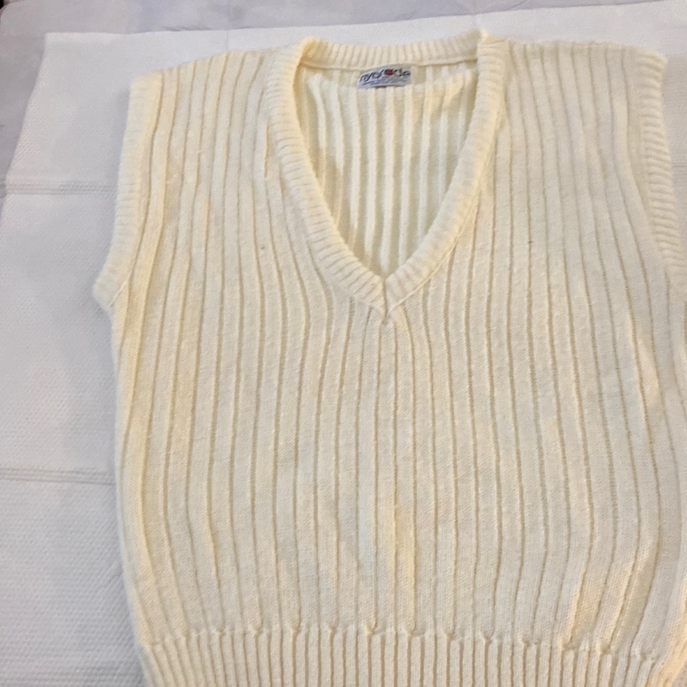 Cream colored large vest for the winter